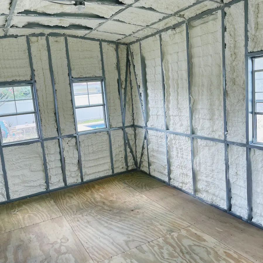 Closed-cell spray foam insulation applied to wall cavities in a residential project in Cortez